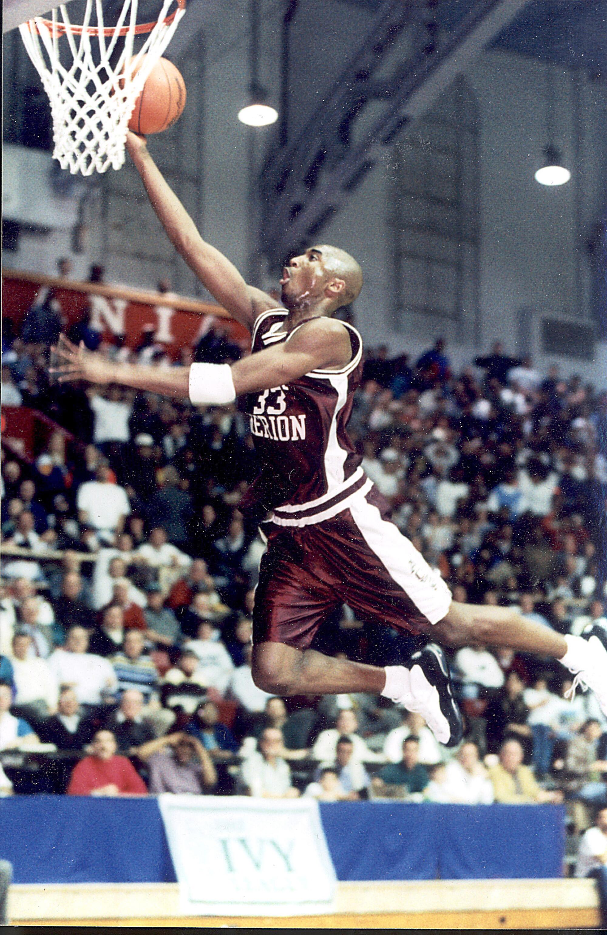 Lower Merion's Kobe Bryant goes to the basket at the Palestra in Philadelphia during a 1996 playoff game against Coatsville.