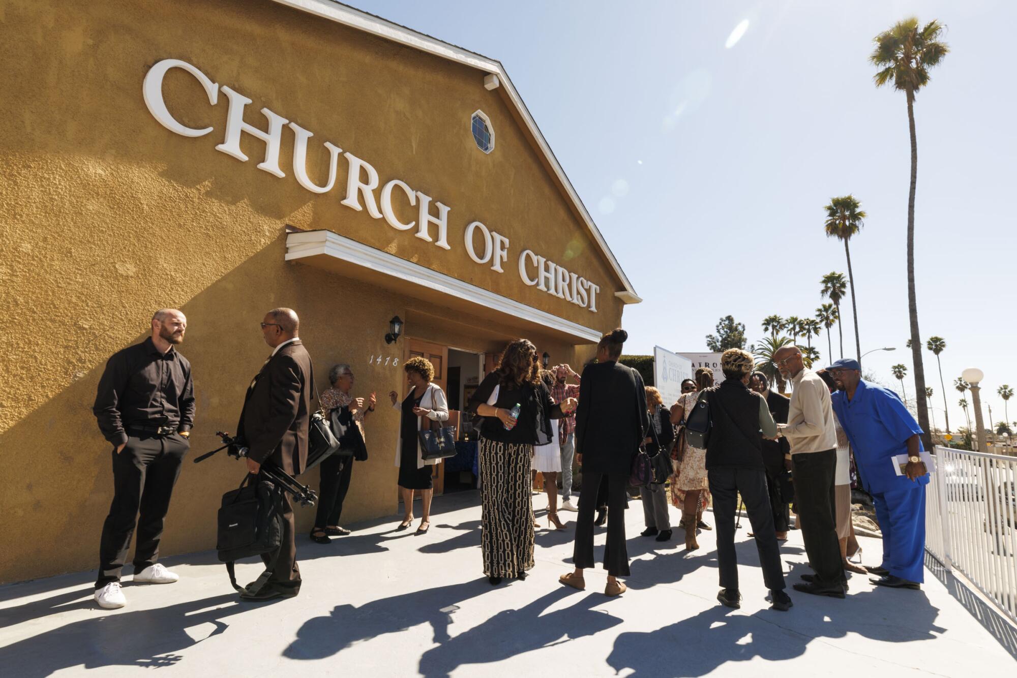 Church members leave after a Sunday congregation at the Church of Christ in Pasadena.