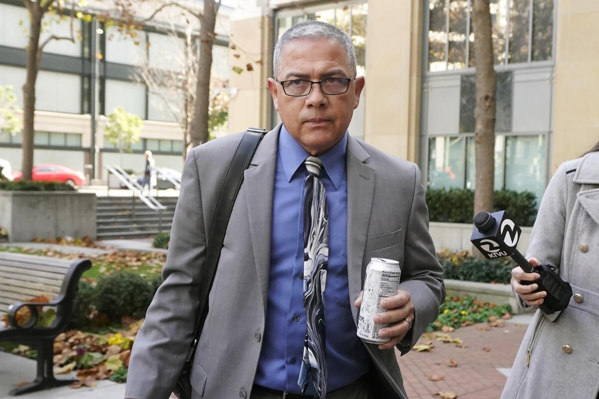 A man leaves a federal courthouse.