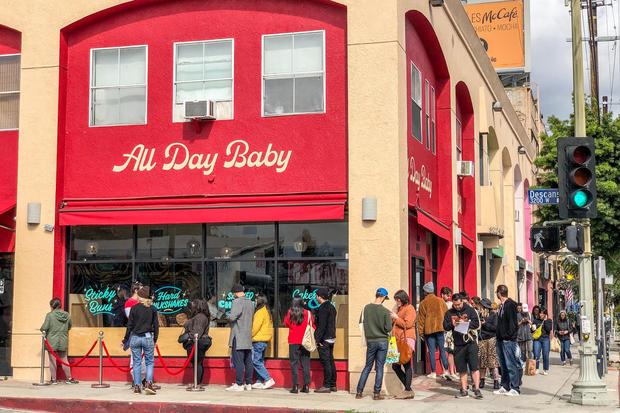 People line up around the block outside All Day Baby in its final days of operation.