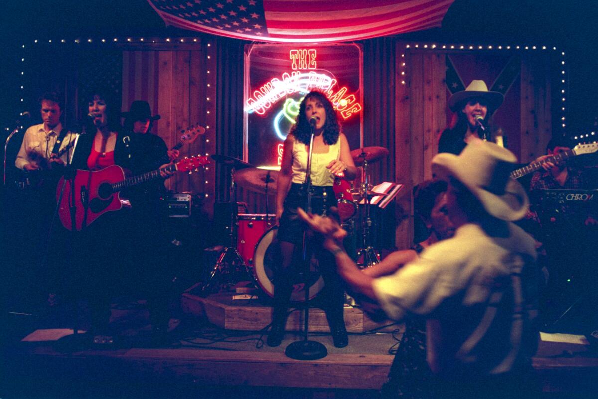 The band Mr. Dyer's Daughters performs on stage at Cowboy Palace in Chatsworth in 1997.