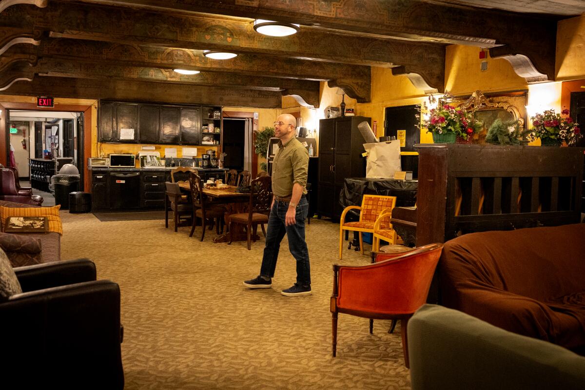 Danny Feldman leads a tour of a large dressing room.