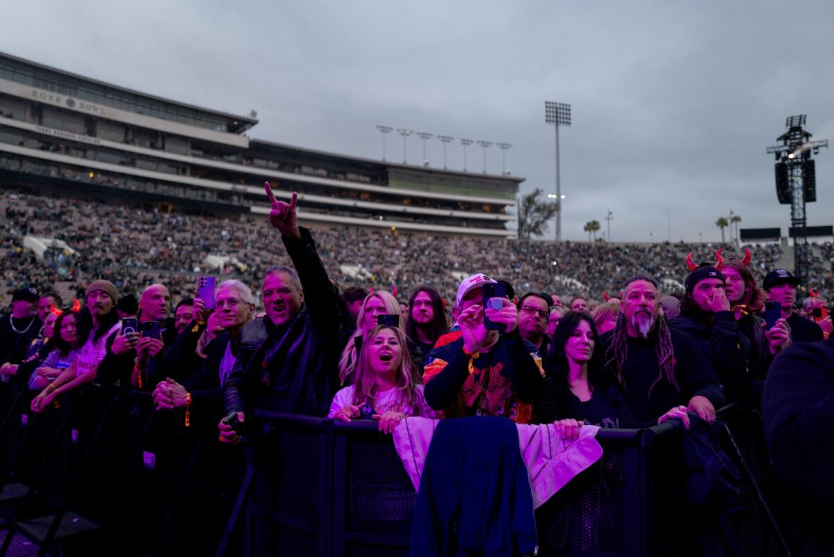 Fans cheer at AC/DC's show Friday.