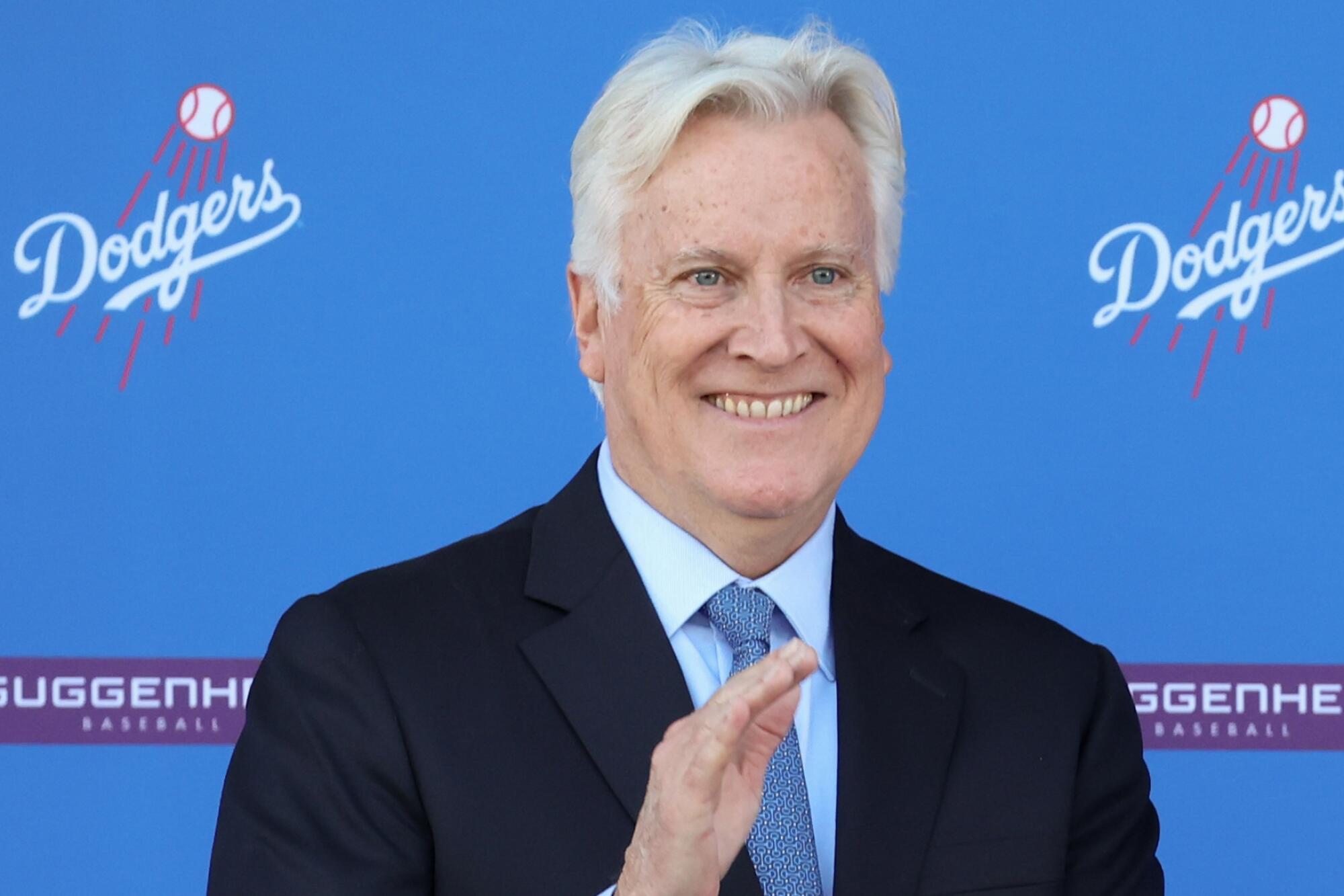 Dodgers owner Mark Walter claps during Shohei Ohtani's introductory press conference on Dec. 14, 2023.